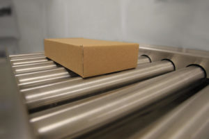Pesage en ligne de cartons