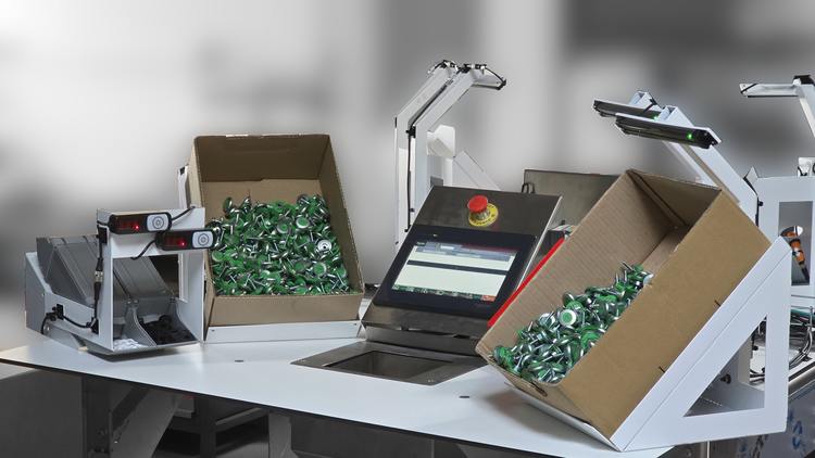 Remplissage automatique de caisses avec pesage